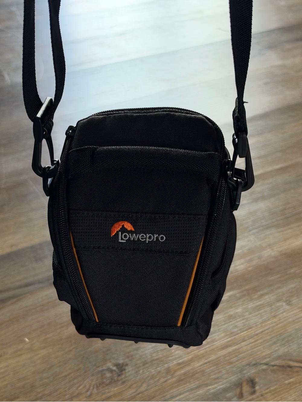 Lowepro Compact Black Shoulder Bag with Orange Trim